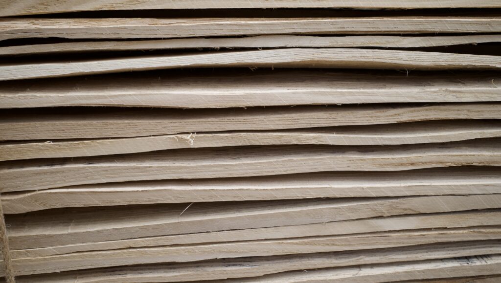 Layers of traditional Japanese KURE boards split along the wood grain